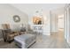 Living room with comfortable seating and a view of the kitchen at 2711 Emerald Lake Ct, Kissimmee, FL 34744