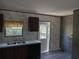 Kitchen with door leading to the backyard at 31541 Hillcrest Dr, Eustis, FL 32736