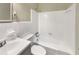 Clean bathroom with white tile and bathtub at 3700 Timber Trl, Orlando, FL 32808