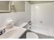 Clean bathroom with white tile and bathtub at 3700 Timber Trl, Orlando, FL 32808
