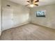 Bright bedroom with neutral walls and carpeted floors at 3700 Timber Trl, Orlando, FL 32808