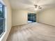 Bedroom with sliding glass doors leading to a patio at 3700 Timber Trl, Orlando, FL 32808