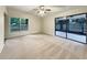 Spacious living room with sliding glass doors leading to a patio at 3700 Timber Trl, Orlando, FL 32808