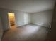 Bedroom with neutral carpeting and walk-in closet at 4215 S Semoran Blvd # 10, Orlando, FL 32822