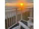 Sunrise view from a balcony overlooking the ocean at 4225 S Atlantic Ave # 226, New Smyrna Beach, FL 32169