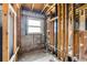 Unfinished bathroom with a window and plumbing at 6427 Sunshine St, Orlando, FL 32818