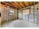 Unfinished bedroom with wood framing, drywall, and flooring at 6427 Sunshine St, Orlando, FL 32818