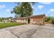 Charming stone front home with a large driveway at 6427 Sunshine St, Orlando, FL 32818