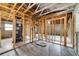 Under construction interior with exposed framing and mechanicals at 6427 Sunshine St, Orlando, FL 32818
