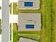 Aerial view of a house with solar panels on the roof at 729 Hitch Loop, St Cloud, FL 34772