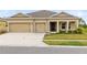 Two-car garage and front entryway at 729 Hitch Loop, St Cloud, FL 34772