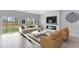 Living room with fireplace and plenty of natural light at 729 Hitch Loop, St Cloud, FL 34772