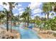 Enjoy a relaxing float down this resort's lazy river at 836 Desert Mountain Ct, Reunion, FL 34747