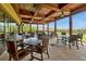 Outdoor dining area with multiple tables and chairs at 836 Desert Mountain Ct, Reunion, FL 34747