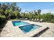 Private pool and spa with lounge chairs at 836 Desert Mountain Ct, Reunion, FL 34747