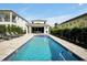 Luxury pool and spa area with a view of the home at 836 Desert Mountain Ct, Reunion, FL 34747