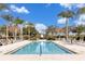 Large resort-style pool with plenty of lounge chairs at 836 Desert Mountain Ct, Reunion, FL 34747