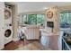 Convenient laundry room with stackable washer and dryer, near living area at 1038 E Michigan St # 1, Orlando, FL 32806