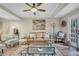 Spacious living room with leather sofa and access to a private patio at 1038 E Michigan St # 1, Orlando, FL 32806