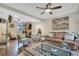 Comfortable living room with two armchairs and a large artwork at 1038 E Michigan St # 1, Orlando, FL 32806