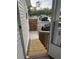 Steps leading to a home's entrance with a yard view at 1111 Sunflower Trl, Orlando, FL 32833