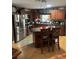 Kitchen with an island, stainless steel appliances, and wood cabinets at 1111 Sunflower Trl, Orlando, FL 32833