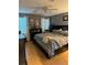 Main bedroom with king-size bed and neutral color tones at 1111 Sunflower Trl, Orlando, FL 32833