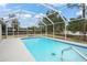 Refreshing screened-in pool, perfect for relaxation at 162 Pecan Dr, Ocala, FL 34472