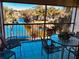 Spacious balcony overlooking a lake with patio furniture at 3 Escondido Cir # 18, Altamonte Springs, FL 32701