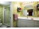 Bathroom with walk-in shower, white vanity, and monkey wallpaper at 3 Escondido Cir # 18, Altamonte Springs, FL 32701