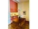 Bright dining area with wood table and kitchen pass-through at 3 Escondido Cir # 18, Altamonte Springs, FL 32701