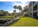 Inviting exterior view of the community, showcasing beautiful landscaping at 3 Escondido Cir # 18, Altamonte Springs, FL 32701
