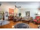 Living room features hardwood floors, fireplace, and comfortable seating at 3 Escondido Cir # 18, Altamonte Springs, FL 32701