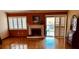 Living room with fireplace, hardwood floors, and access to balcony at 3 Escondido Cir # 18, Altamonte Springs, FL 32701