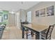 Dining area with a table and chairs, wet bar, and view to entryway at 629 Glastonbury Dr, Orlando, FL 32825