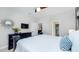 Bedroom with king-size bed and access to living room at 1431 Thunderbird Rd, Davenport, FL 33896