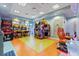 Fun community game room with various arcade games at 1431 Thunderbird Rd, Davenport, FL 33896