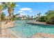 Relaxing lazy river winding through landscaping at 1431 Thunderbird Rd, Davenport, FL 33896