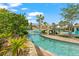 Peaceful lazy river with a wooden bridge at 1431 Thunderbird Rd, Davenport, FL 33896