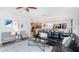 Open living room with sectional sofa and kitchen views at 1431 Thunderbird Rd, Davenport, FL 33896