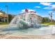 Fun splash pad with a small slide for  at 1431 Thunderbird Rd, Davenport, FL 33896