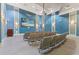 Community theater room with comfortable seating and large screen at 1431 Thunderbird Rd, Davenport, FL 33896