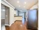 Bright kitchen with stainless steel appliances and ample cabinetry at 308 Halstead Dr, Davenport, FL 33897
