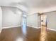 Hardwood floor living room with open concept to kitchen at 308 Halstead Dr, Davenport, FL 33897