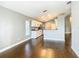 Open living room with hardwood floors and kitchen access at 308 Halstead Dr, Davenport, FL 33897
