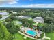 Aerial view of community amenities including pool and tennis courts at 3904 Plantation Blvd, Leesburg, FL 34748