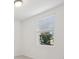 Bedroom with window and neutral wall colors at 4702 Jasmine Cir, Leesburg, FL 34748