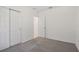 Bedroom with carpet, double doors and window at 4702 Jasmine Cir, Leesburg, FL 34748