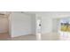 Bright living room with tile floors and access to a patio at 4702 Jasmine Cir, Leesburg, FL 34748