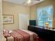 Bedroom with ceiling fan, double closet and window at 4839 Eaglesham Dr, Orlando, FL 32826